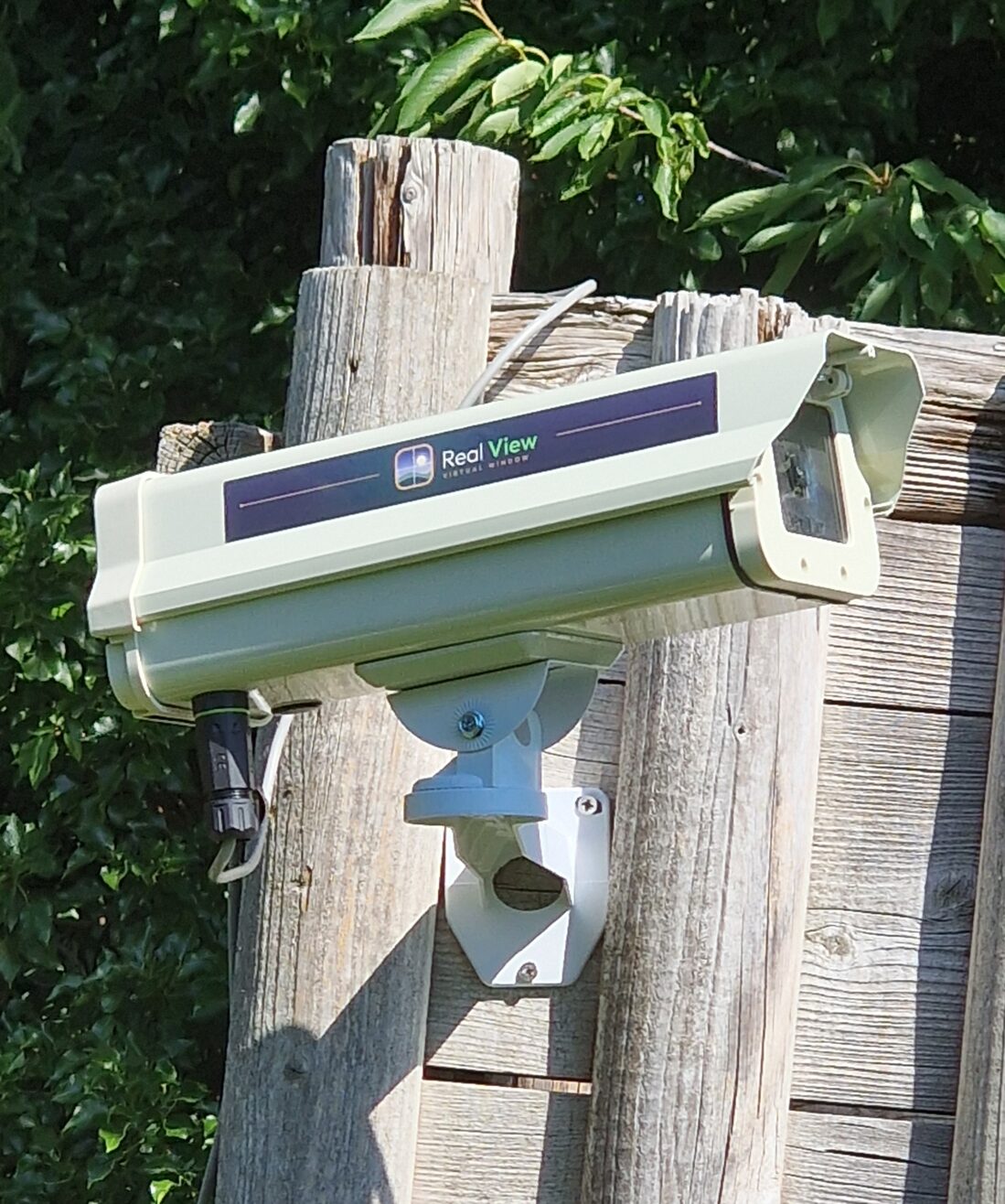 The Real View wildlife camera installed in its weatherproof outdoor enclosure